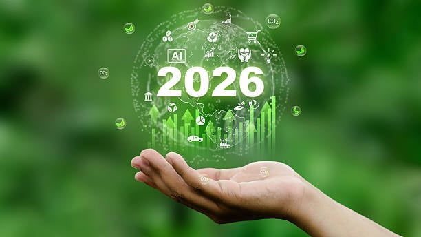 An open hand holds a digital globe featuring the year "2026" and green growth charts.